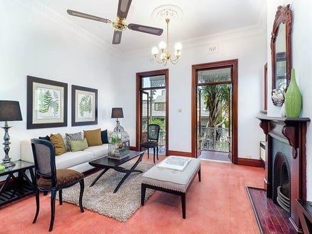 Carefully renovated lounge at 24 Arthur Street, Lavender Bay, retaining cornice, timber surrounds and fireplace surround.