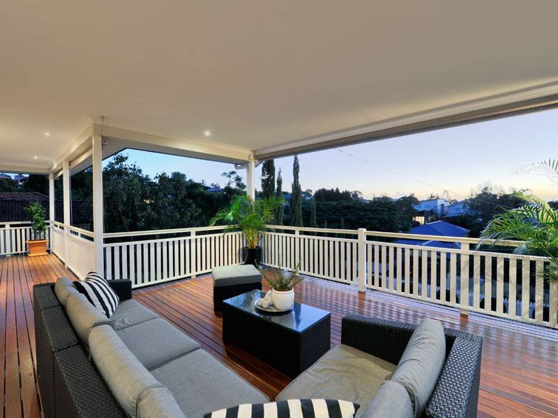 Indoor-outdoor outdoor living design with balcony & decorative ...